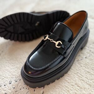 Thursday Boot Company Glossy Black Loafers with Chain Accent